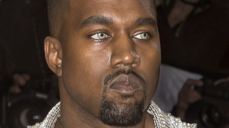 Kanye West wears contact lenses
