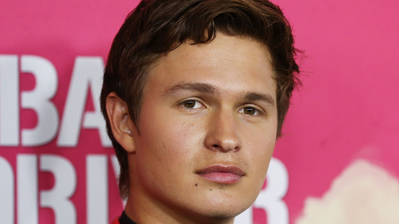 Ansel Elgort poses at an event for Baby Driver