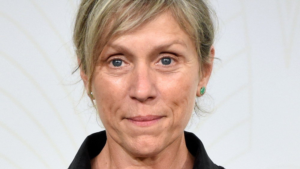 Frances McDormand smirking 