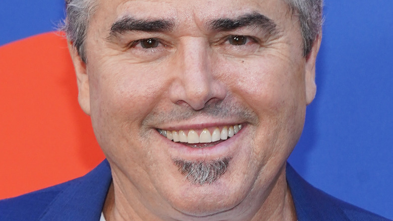 Christopher Knight smiling on the red carpet
