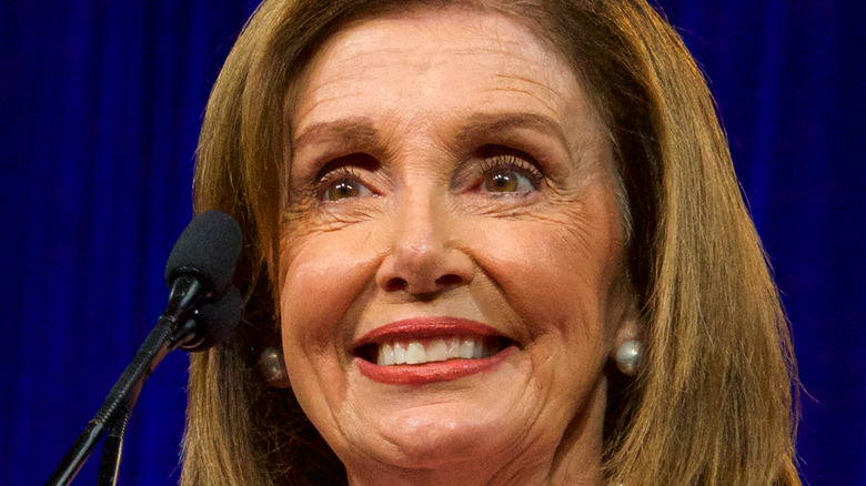 House Speaker Nancy Pelosi smiles