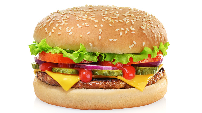 Cheeseburger prepared by a food stylist with an isolate white background 