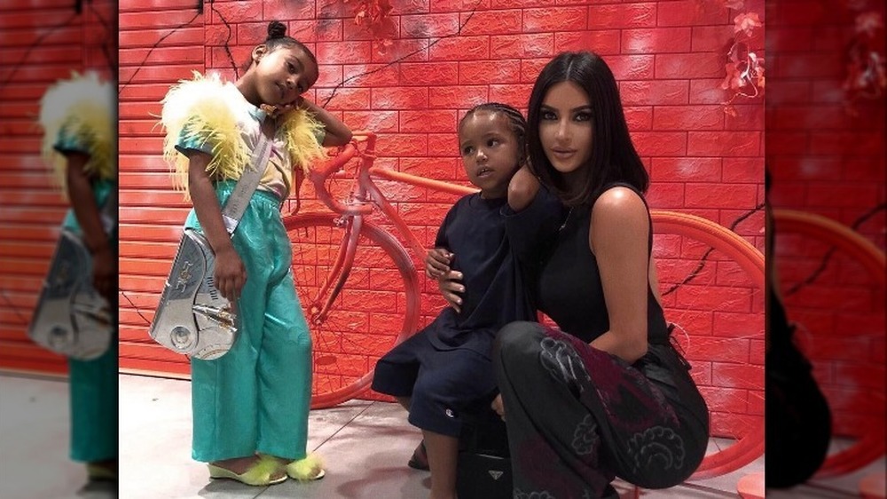 Kim Kardashian North Saint red wall