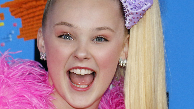 JoJo Siwa poses on the red carpet