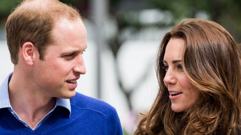 Prince William and Kate Middleton walking and talking 
