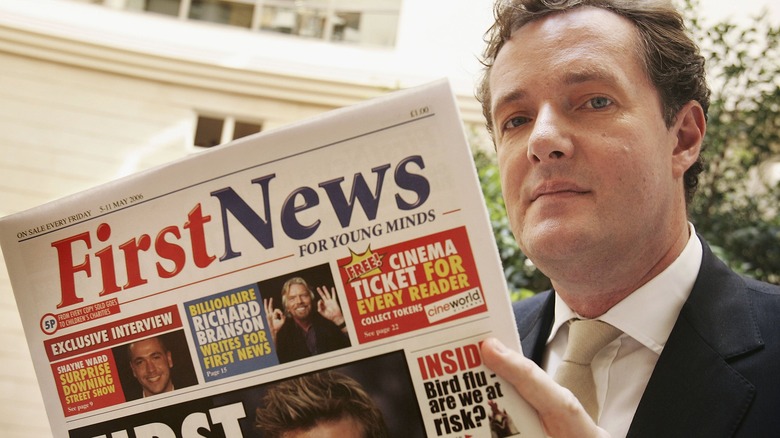 Piers Morgan reading newspaper