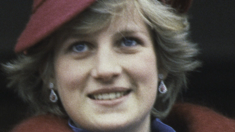 Princess Diana smiling and looking up