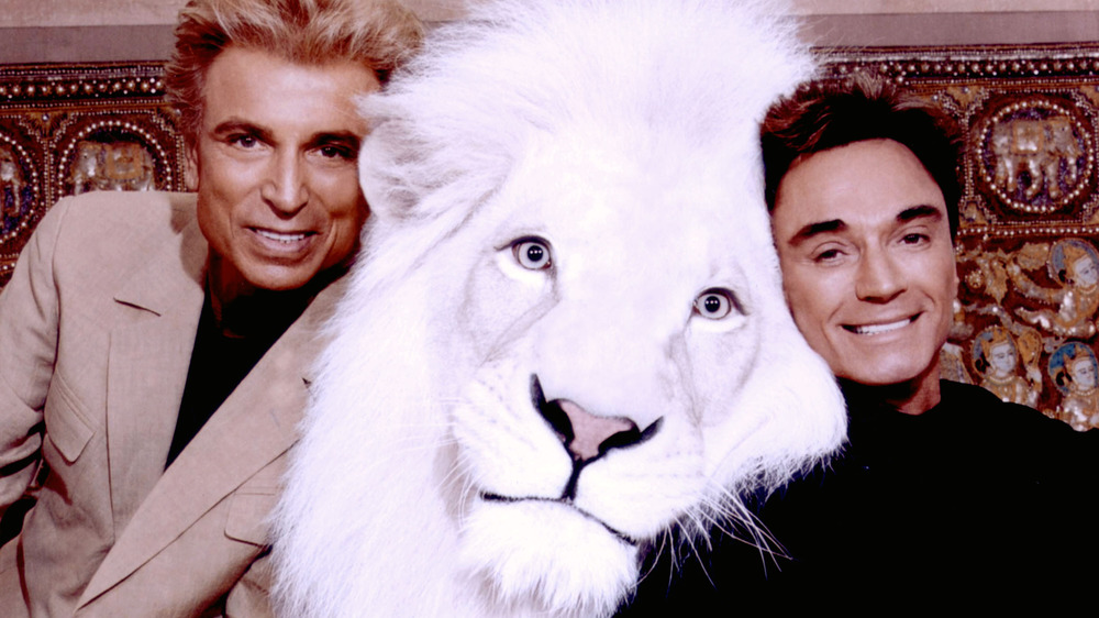 Siegfried and Roy posing