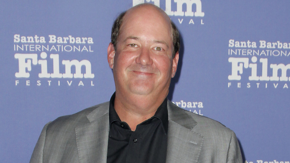 Brian Baumgartner with a small smile