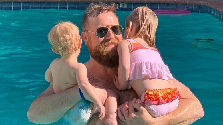 Ben Napier swimming with his two daughters