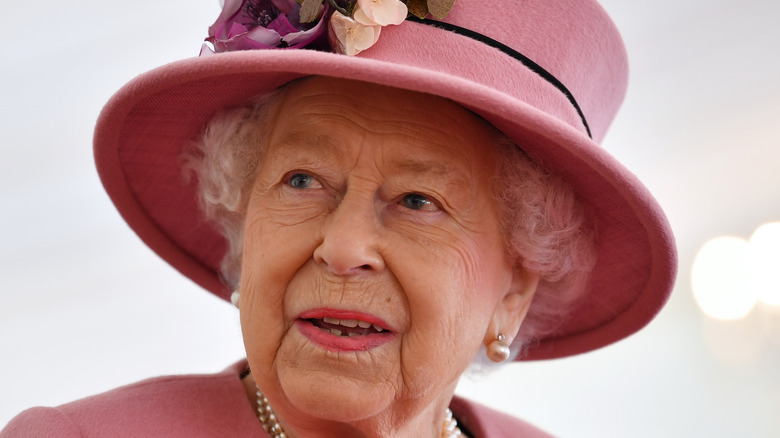 Queen Elizabeth looks away from the camera