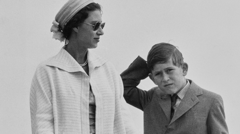 Princess Margaret and Prince Charles stand side by side