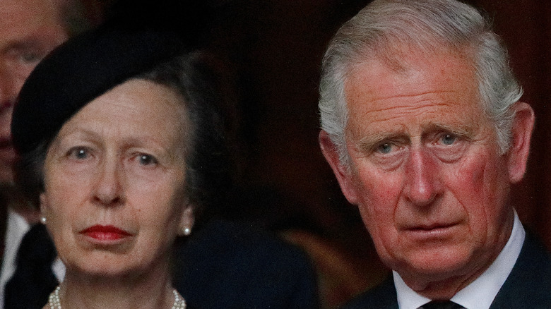 Princess Anne and Prince Charles at an event