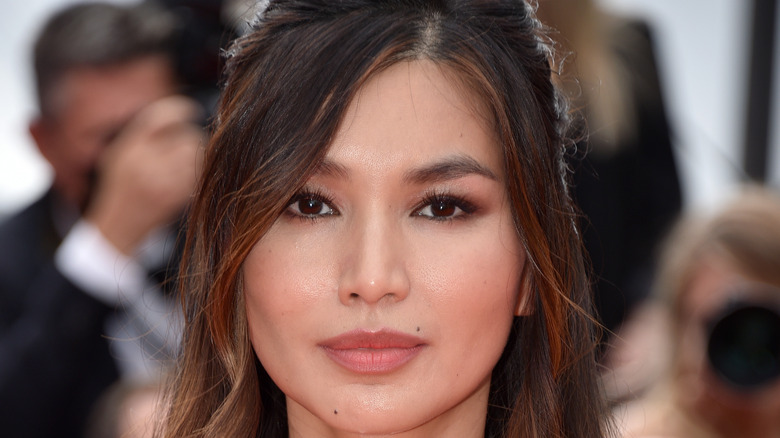 Gemma Chan poses on the red carpet