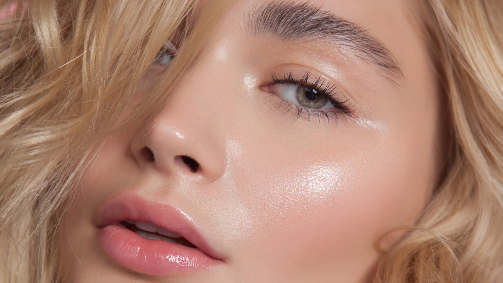 The TikTok Makeup Trend You Should Try For A 'Glass Skin' Dewy Look