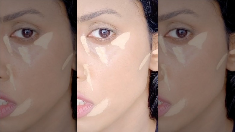 TikTok user Megha Singh with concealer on her face.