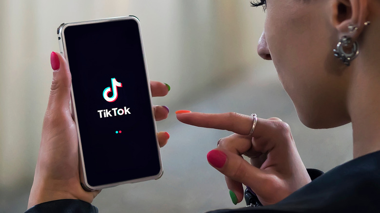 Woman using TikTok