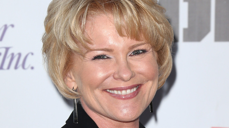 Judi Evans smiling