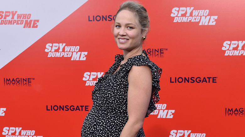 Christensen at a red carpet premiere while pregnant