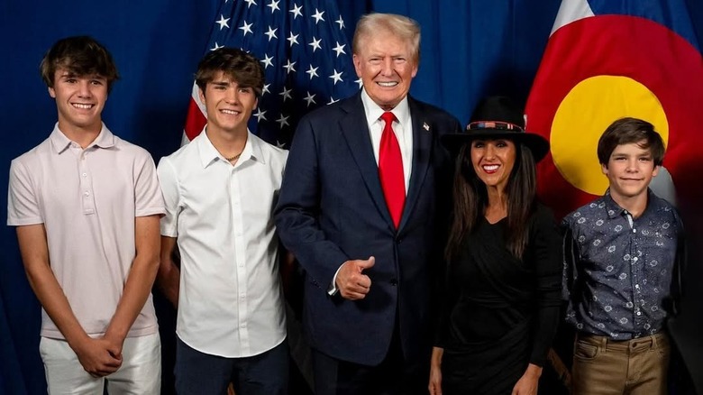 Lauren Boebert poses with her sons and Donald Trump