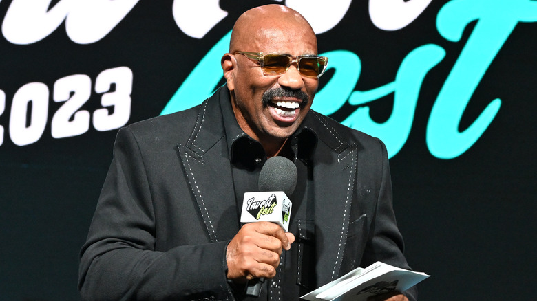 Steve Harvey speaking onstage