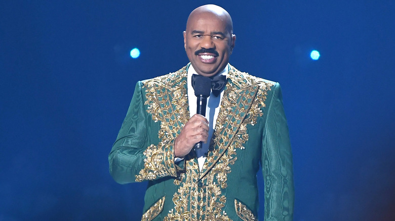 Steve Harvey speaking onstage