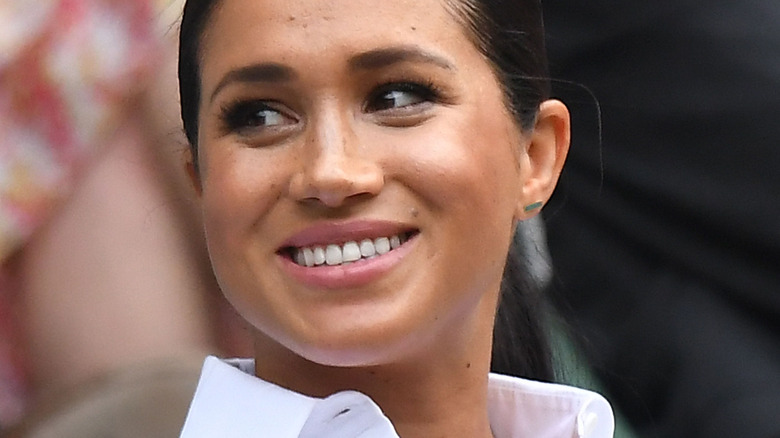 Meghan Markle in white shirt