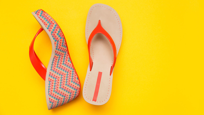 Platform sandals on yellow background