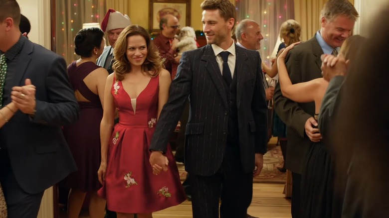 Bethany Joy Lenz (right) and Andrew Walker (left) in "Snowed-Inn Christmas."