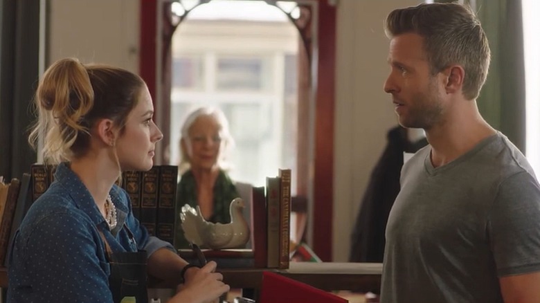 Alexandra Breckenridge (left) and Jamie Spilchuk (right) in "Christmas Around the Corner."