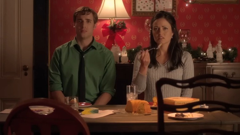 Dustin Milligan (left) and Danica McKellar (right) in "Love at the Christmas Table."