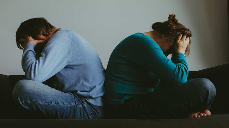 stressed man and woman