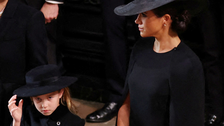 Princess Charlotte of Wales and Meghan Markle on September 19, 2022