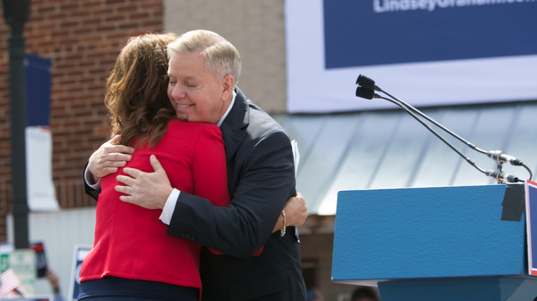 Lindsey and Darline Graham embracing