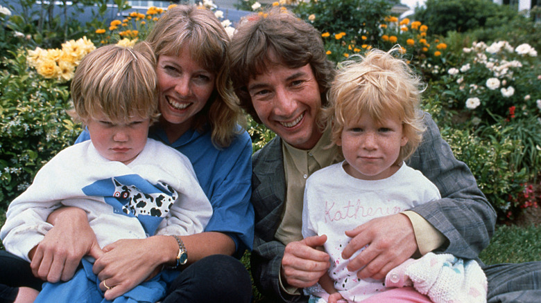 Martin Short and Nancy Dolman smiling with their children