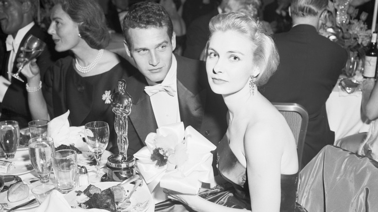 Paul Newman & Joanne Woodward attend the Oscars