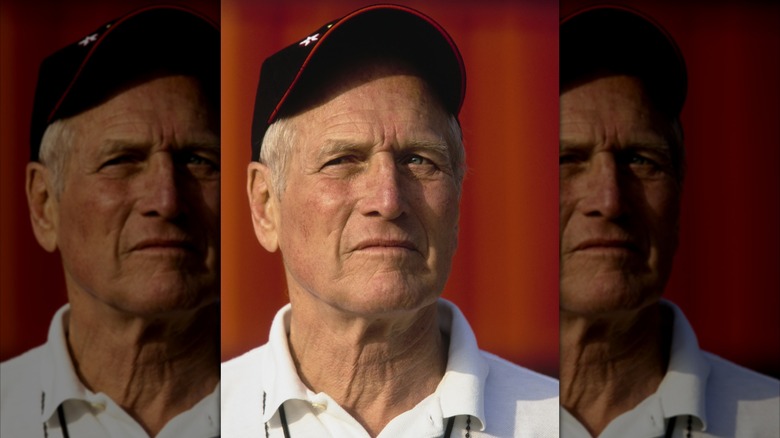 Paul Newman attends a racing event in 2001