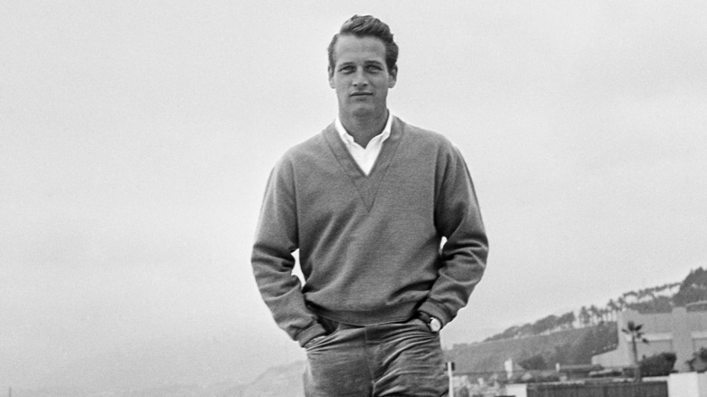 Paul Newman walking on the beach in 1958