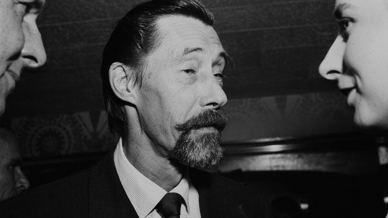 John Carradine attends a party in 1957