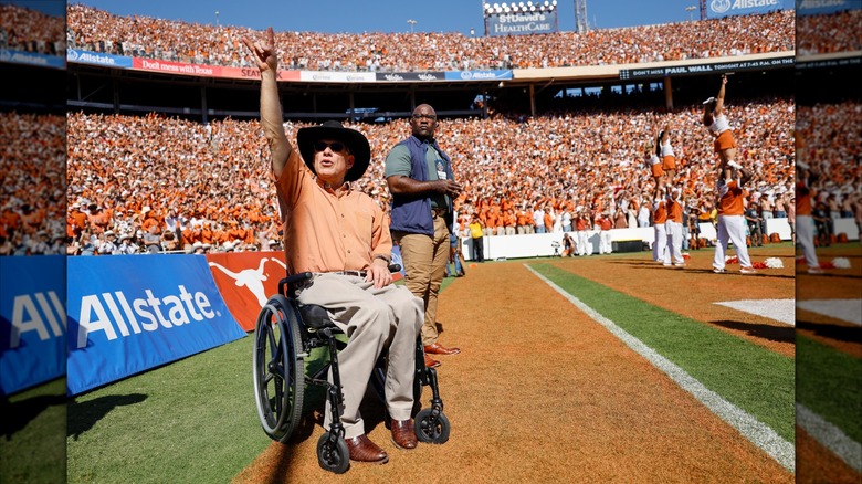 Greg Abbott at a college football game