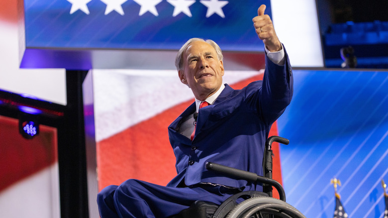 Greg Abbott giving a thumbs up at a political rally