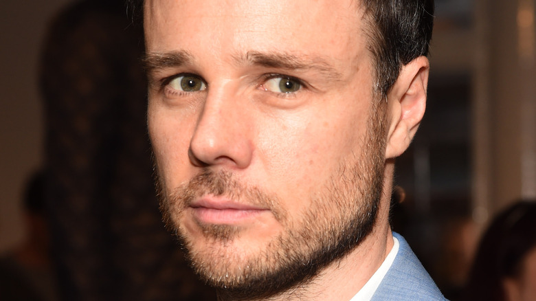 Bridgerton actor Rupert Evans at an event. 