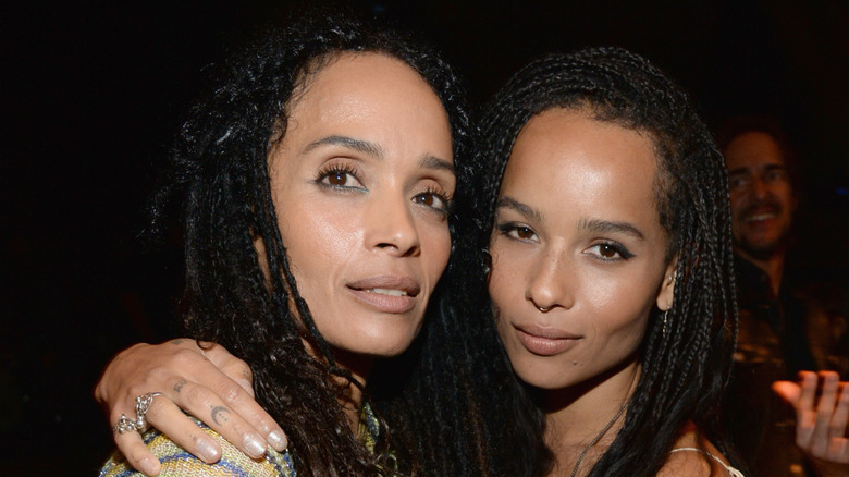 Lisa Bonet and Zoe Kravitz posing together at a Saint Laurent fashion show