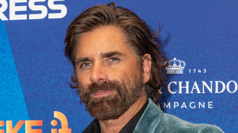 John Stamos posing