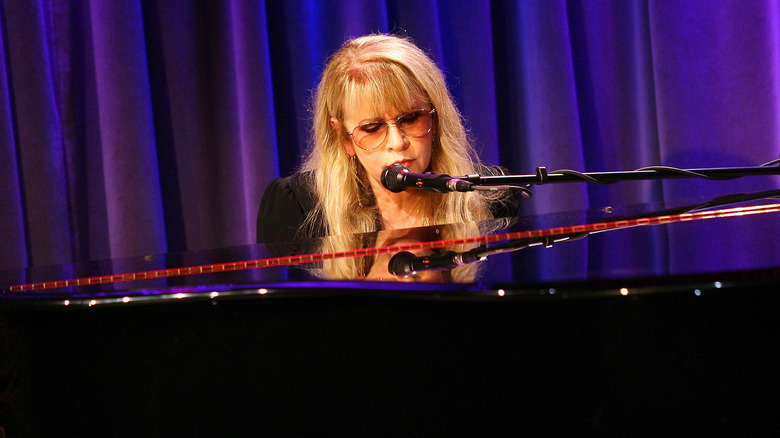 Stevie Nicks playing piano