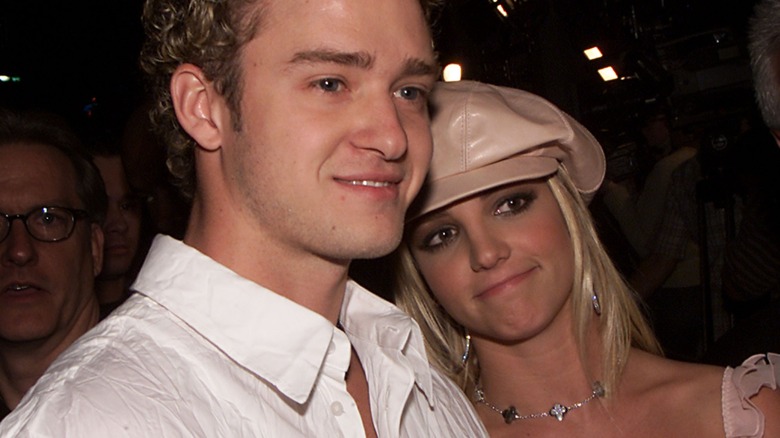 Justin Timberlake and Britney Spears smiling sadly