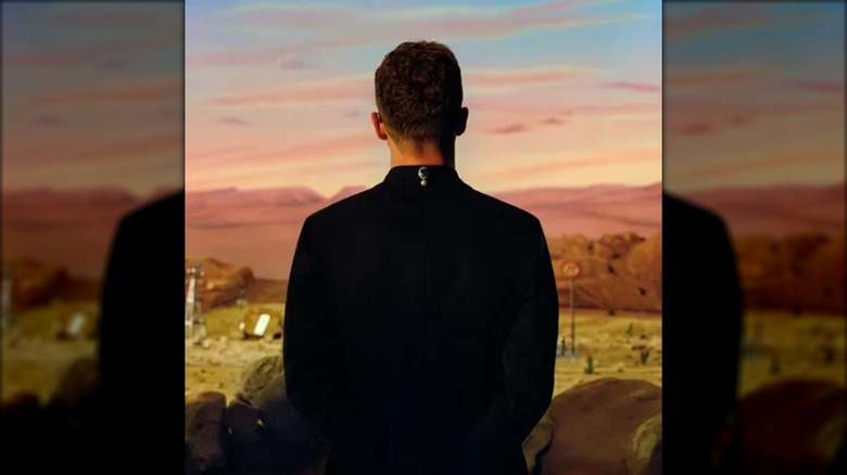 The cover for Justin Timberlake's album Everything I Thought It Was, featuring his back looking out over a model town