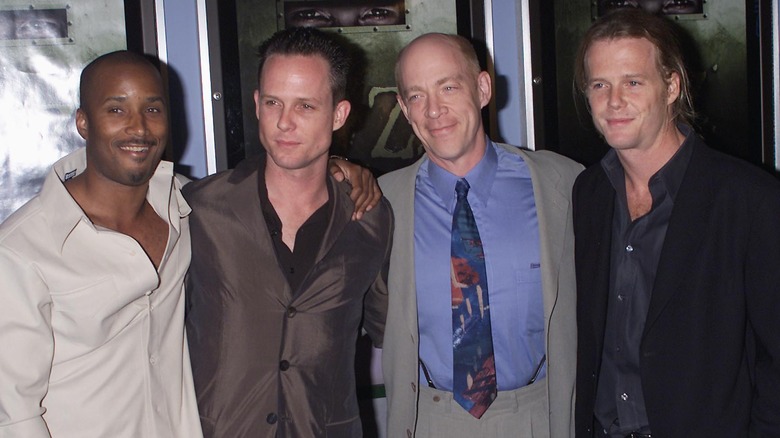 Granville Adams, Dean Winters, J.K. Simmons, and Scott Winters at the premiere of Oz in 2000.