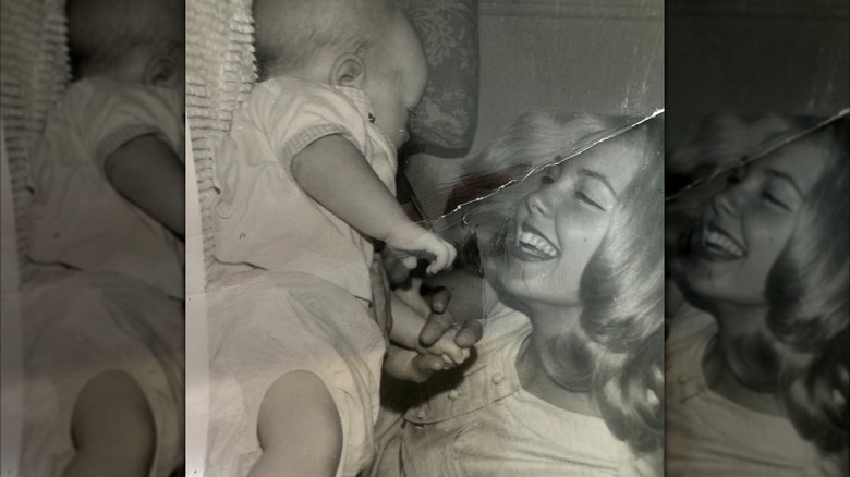 Dean Winters as a baby with his mother.