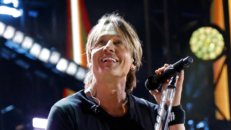 Keith Urban smiling on stage